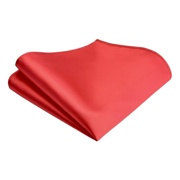 Pochette de costume rouge élégante, accessoire raffiné pour une tenue distinguée