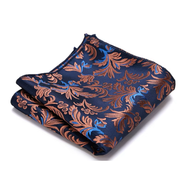 Pochette de costume bleu nuit avec motifs floraux cuivrés – Accessoire raffiné cousu main